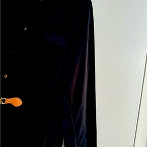 Long stretch button down black dress mid arm.material heavy
